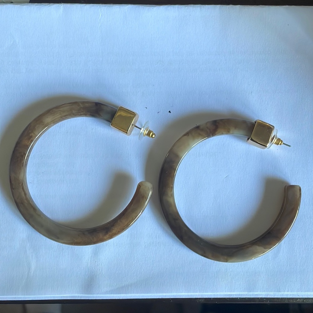 Semi hoop earrings lite on the ear